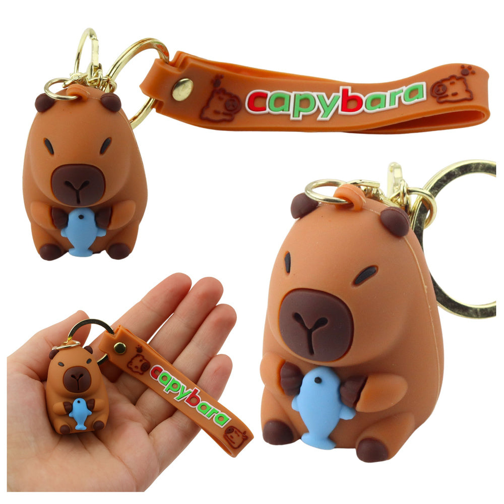 Privjesak za ključeve s motivom kapibare i dupinom - smeđi
