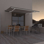 Tenda na ručno uvlačenje s LED svjetlima 500x300 cm krem