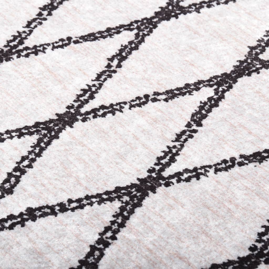 Perivi tepih 160 x 230 cm crno-bijeli