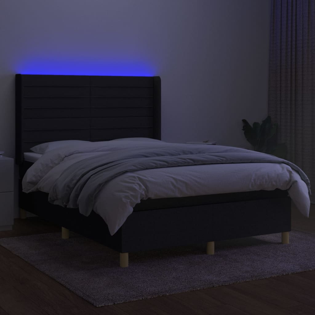 Krevet box spring s madracem LED crni 140x190 cm od tkanine