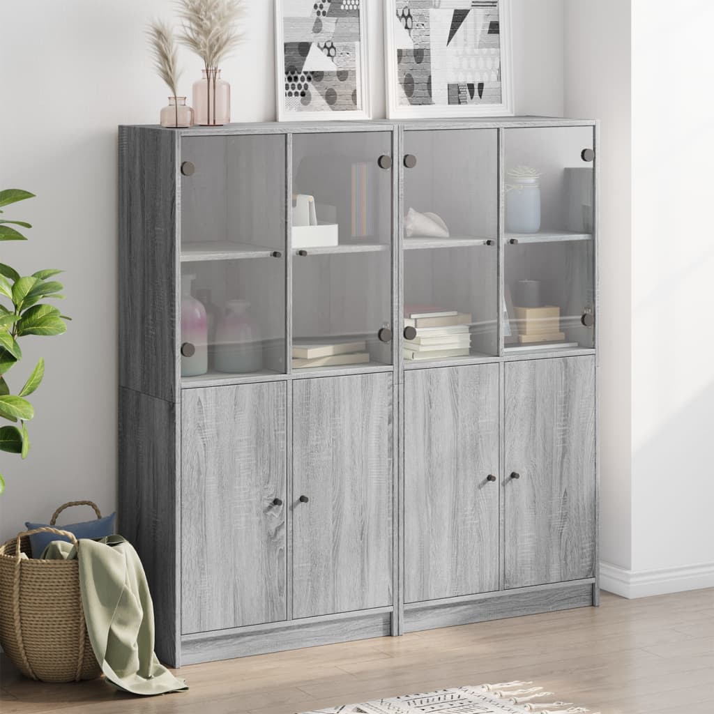 Regal za knjige s vratima boja hrasta 136x37x142 cm drveni