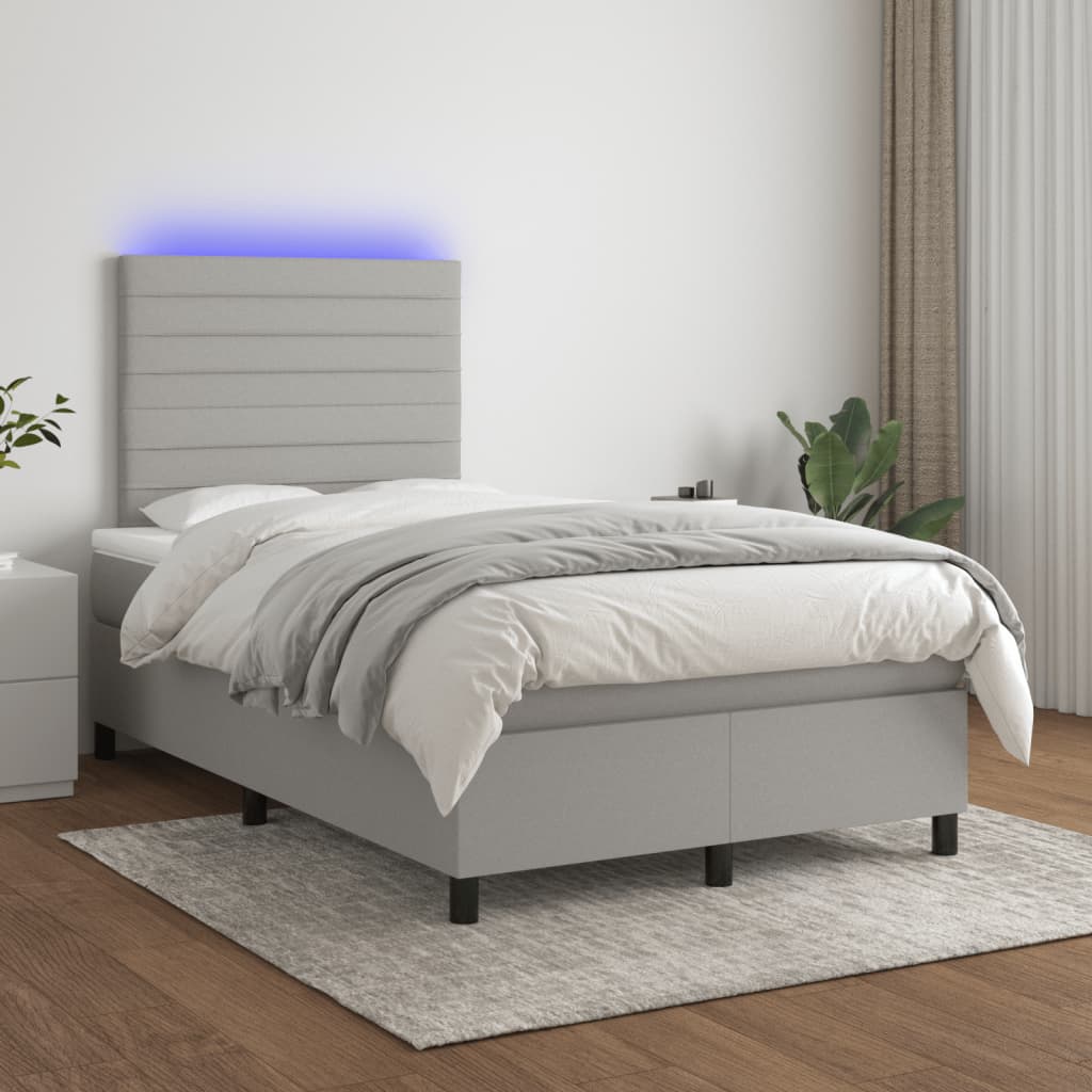Krevet s oprugama i madracem LED svjetlosivi 120x190 cm tkanina