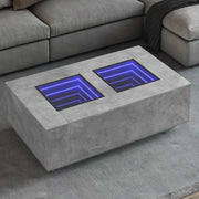 Stolić s beskonačnim LED siva boja betona 116x69x40 cm
