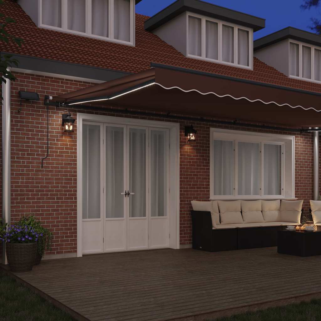 Tenda na ručno uvlačenje s LED smeđa 600 x 300 cm