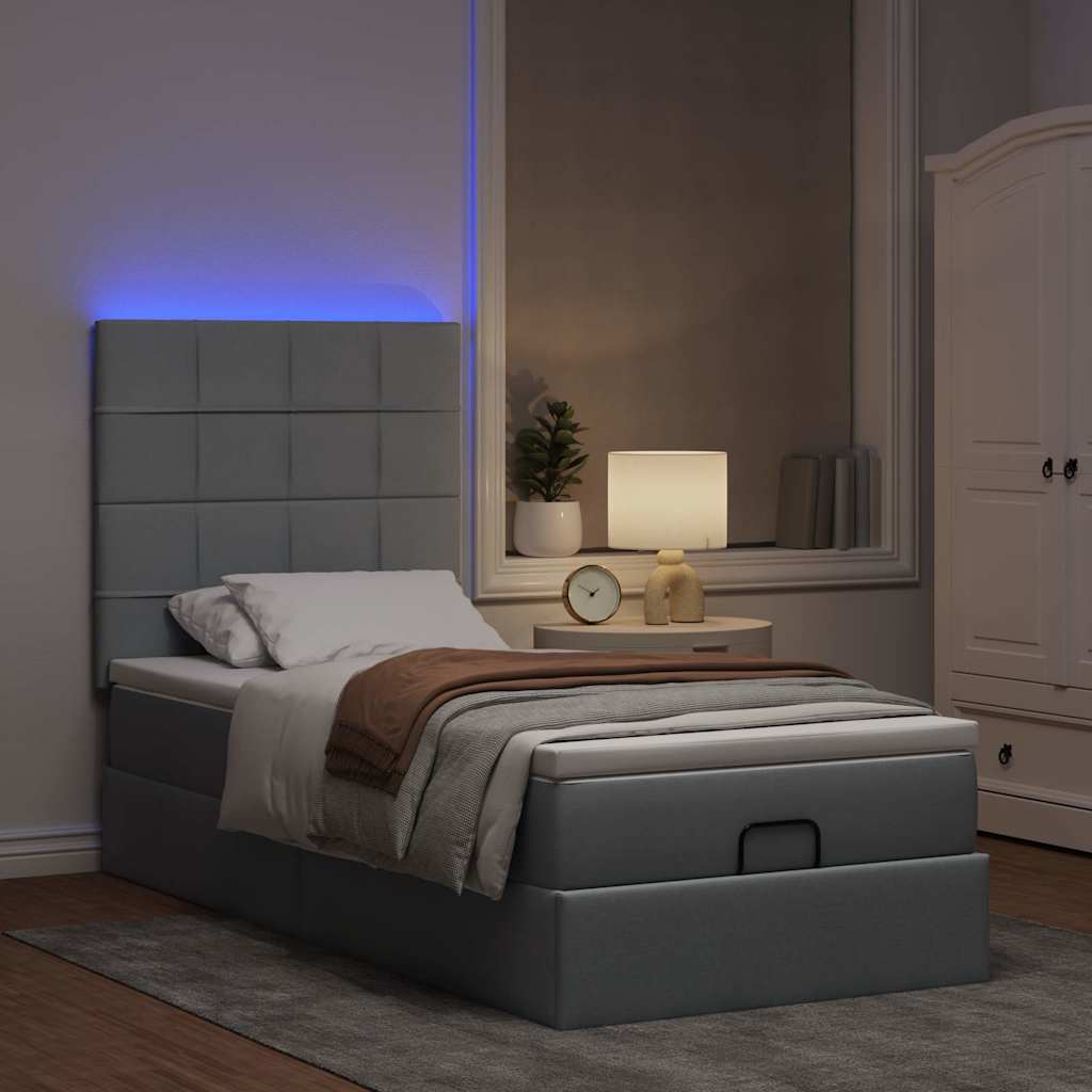 Otomanski krevet s madracem&LED svijetlosivi 90x200 cm tkanine